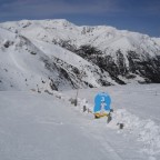 Both piste marker and fence nearly buried in our great snow 21/03