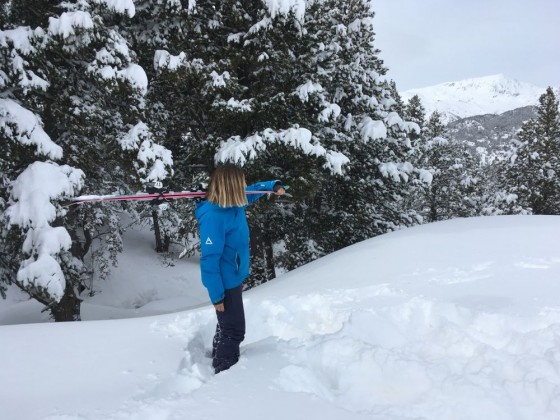 The lovely Esther posing with her Black Crows skis on powder day