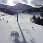 Chairlift over a run in El Tarter