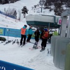 World Cup competitors catch the chairlift