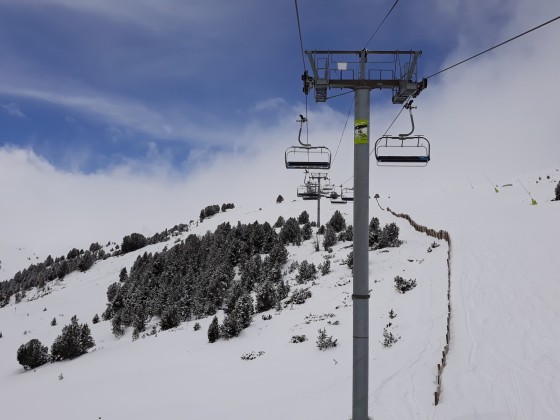 Blue sky creeping through above the Solana chairlift