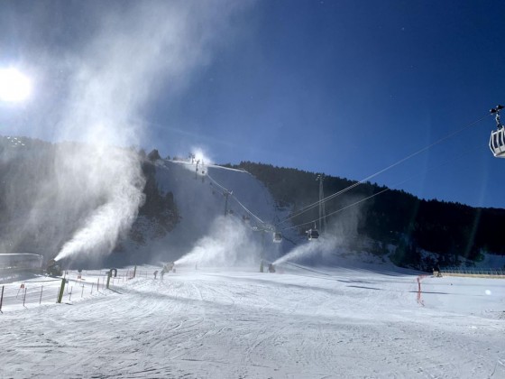 Snow cannons blasting at the bottom of the black L'Avet run