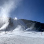 Snow cannons blasting at the bottom of the black L'Avet run