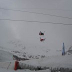 Two Skiers Jumping Together