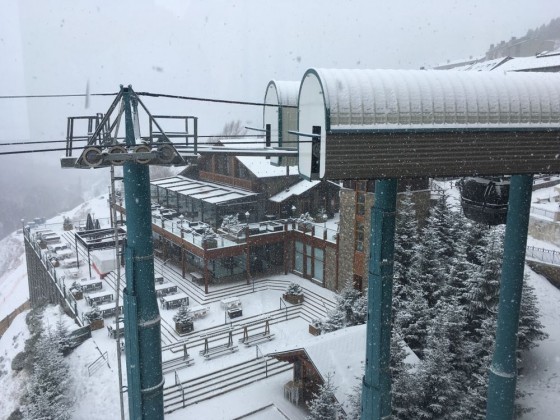 The gondola station and Sol I Neu covered with snow